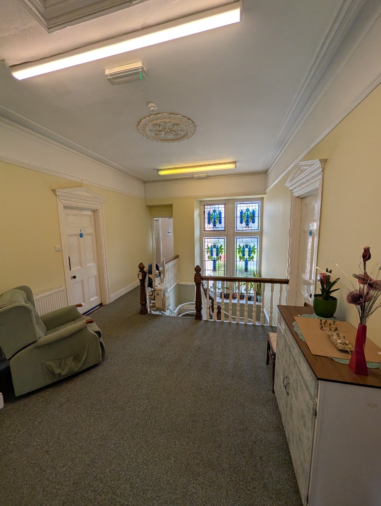 A quiet shared seating area on the landing
