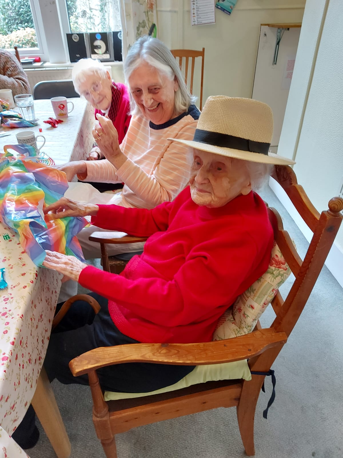 Residents celebrating a birthday together at Treveor House